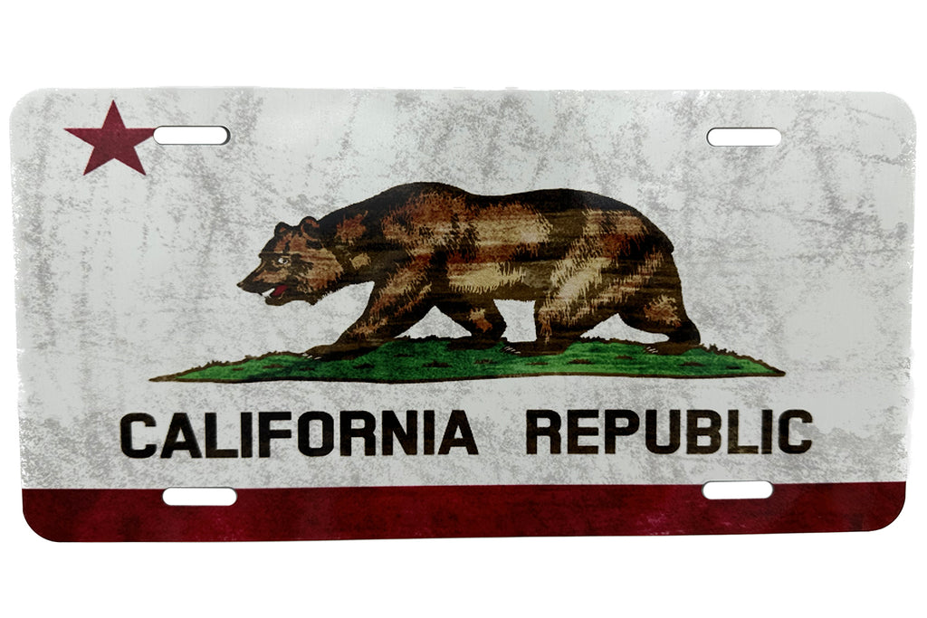 Ink Trendz California State Flag The Golden State Vanity License Plate Looking for a stylish way to show off your California pride on the road? Our Ink Trendz California Golden State vanity/novelty license plate is the perfect choice! Made with high-quality materials and featuring a striking design, this license plate is sure to turn heads and make a statement. Whether you're driving a truck or car, this plate is a must-have for any true Golden State. Order yours today and hit the road in style!
