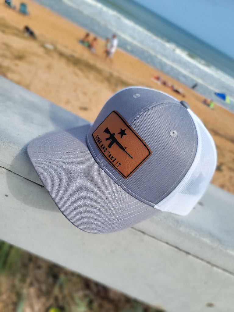 The Peoples Brigade Come and Take It Lone Star Leather Patch Series Structured Baseball Trucker Hat, Etsy Leather Patch Hat, Etsy Hat, AR-15 Hat, Glock Hat, Mossberg Hat, Colt Hat, Remington Hat, Black Rifle Coffee, Black Rifle Hat, Black Rifle, Grunt Style, Nine Line Hat